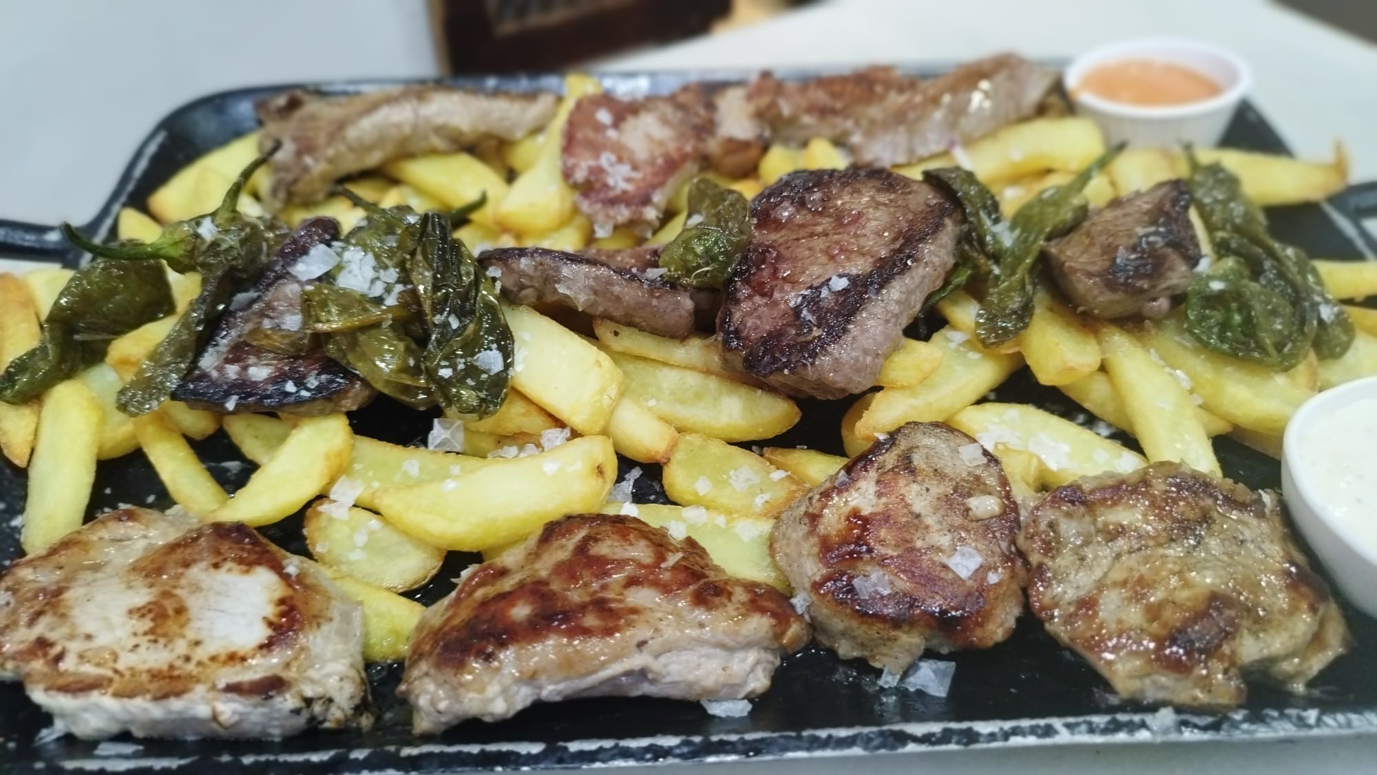 Parrillada: Picaña de novillo argentino, solomillo de cerdo y presa ibérica