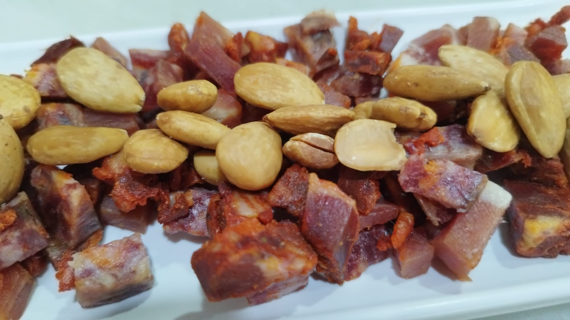 Taquitos ibéricos con almendras